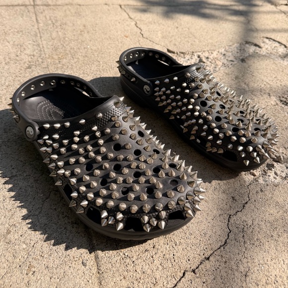 CROCS Other - CROCS‎ Black Slip-On Clogs with Silver Spikes